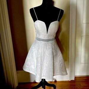 Beautiful White Dress with lace and waist stitching. Size small.